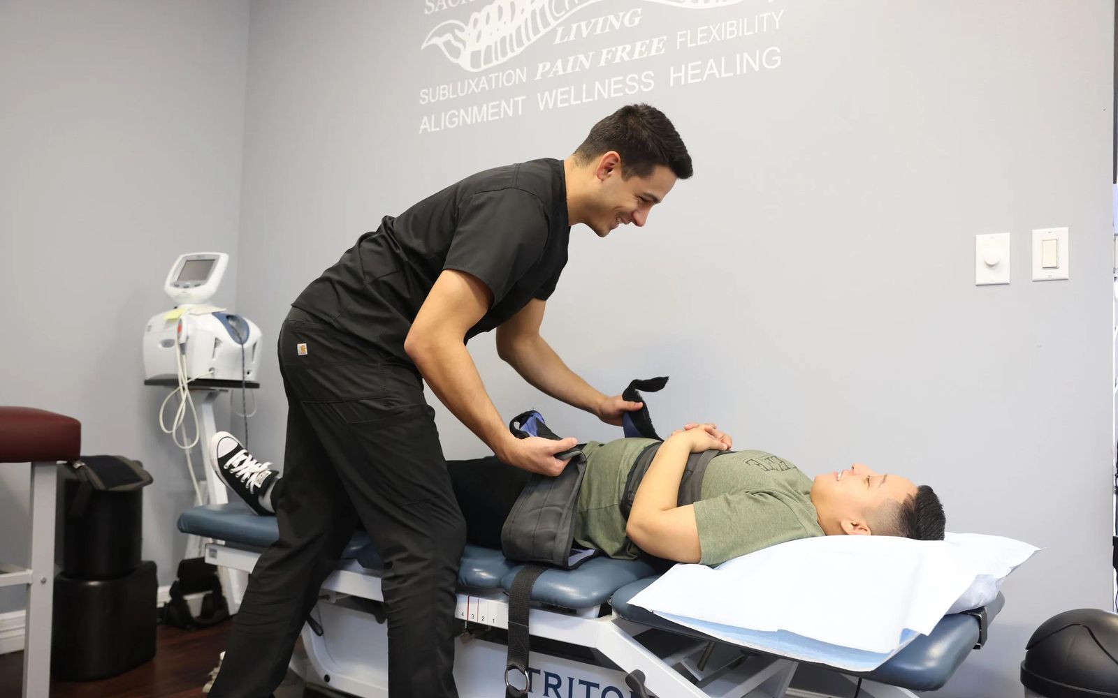 Chiropractic adjustment in progress at Elite Family Chiropractic
